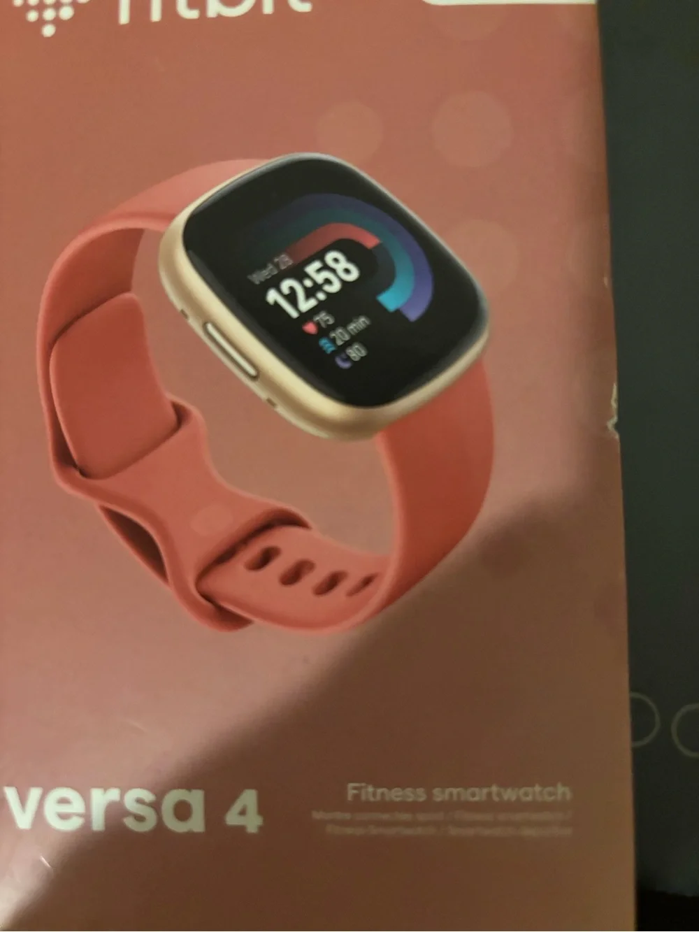 fitbit Versa 4 Coral with Gold-Tone Case